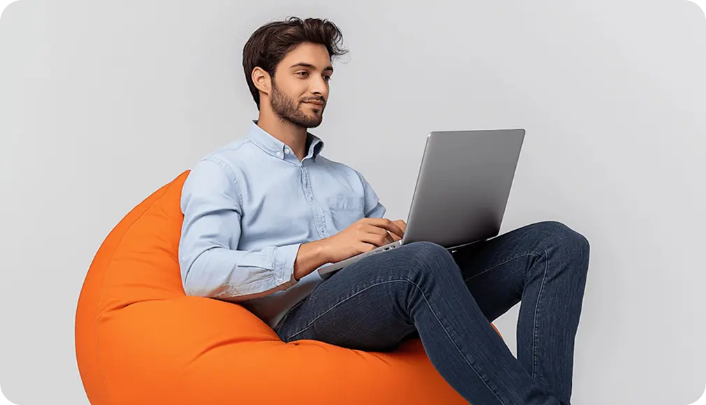 Learner sitting with laptop